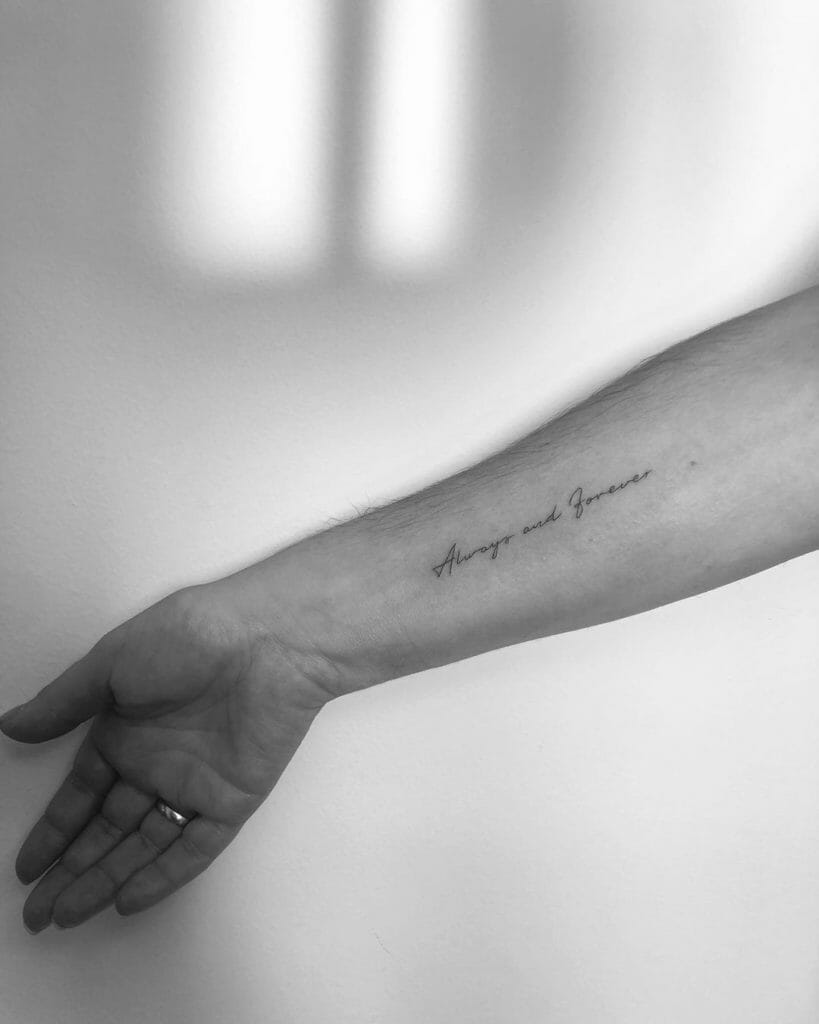 Love always tattoo on the inner forearm