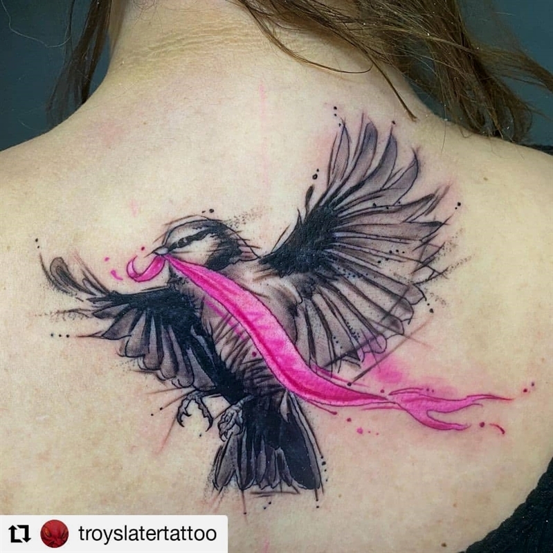 Bird Tattoo With A Breast Cancer Ribbon