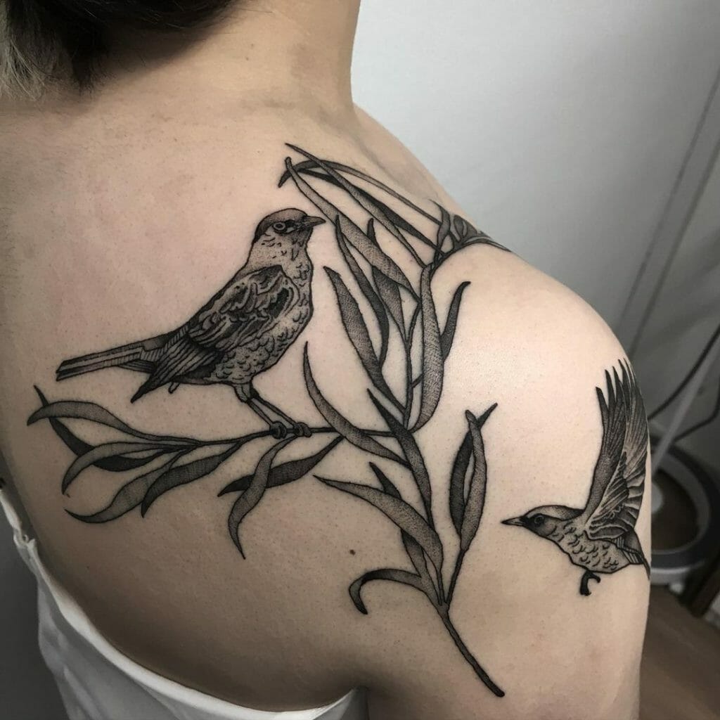 Black And Grey Bird Tattoo