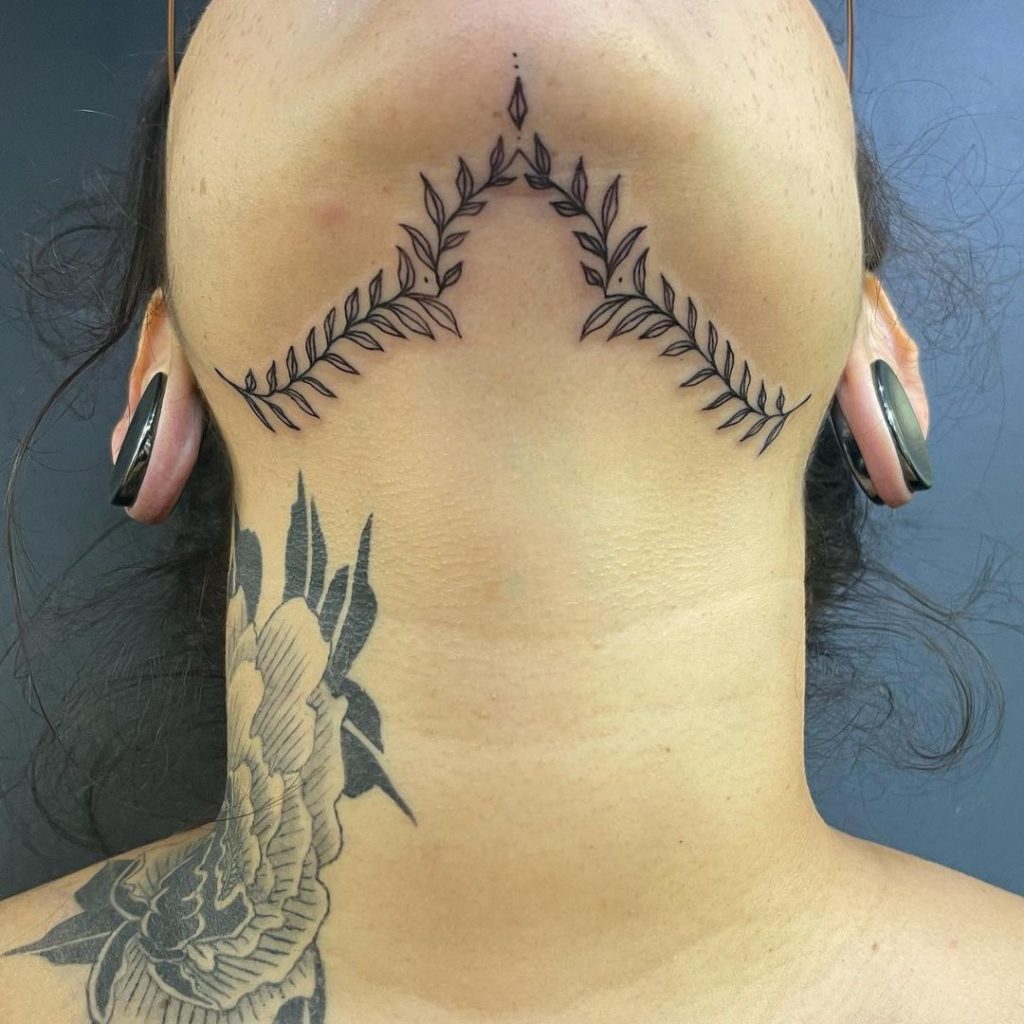 Botanical Chin Tattoo