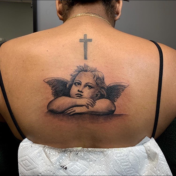 Cherub Angels Tattoo With A Cross