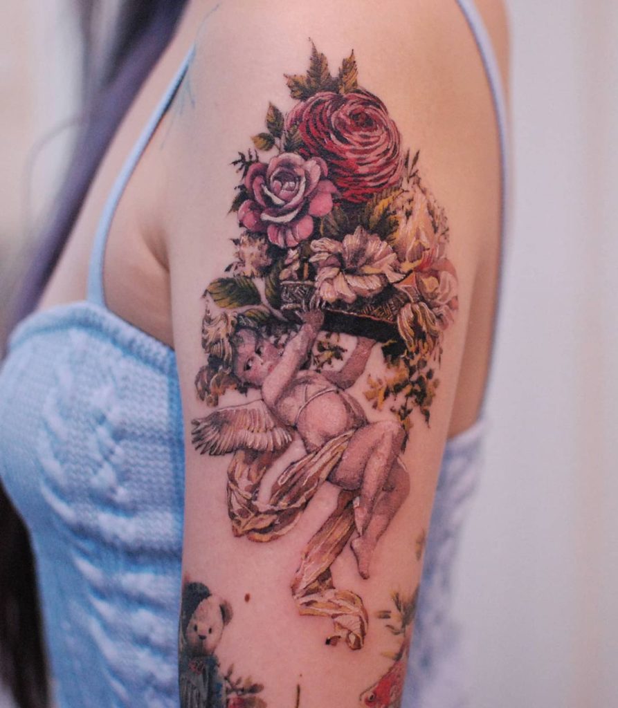 Cherub Tattoo With A Bouquet