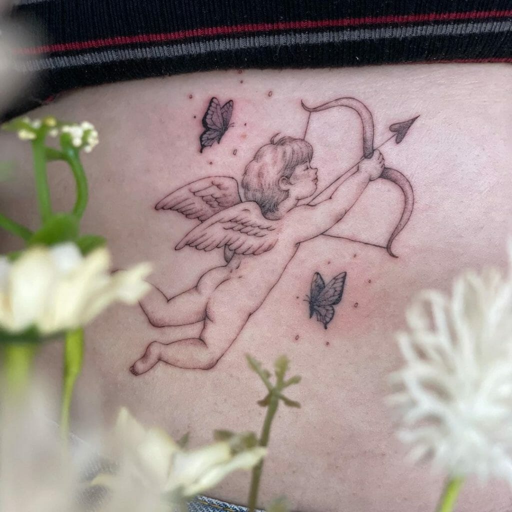 Cupid Tattoo With A Pair Of Butterfly Ideas