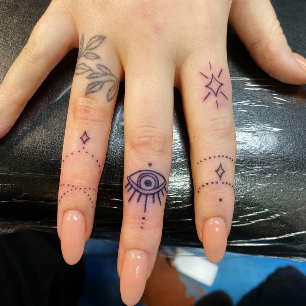 Dainty Evil Eye Tattoos For Your Fingers