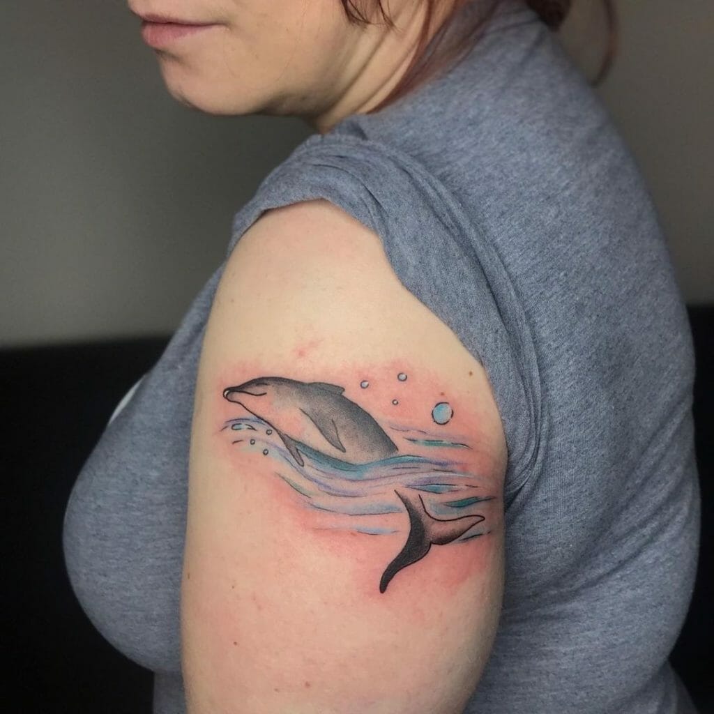 Dolphins Peeping from Water Tattoo