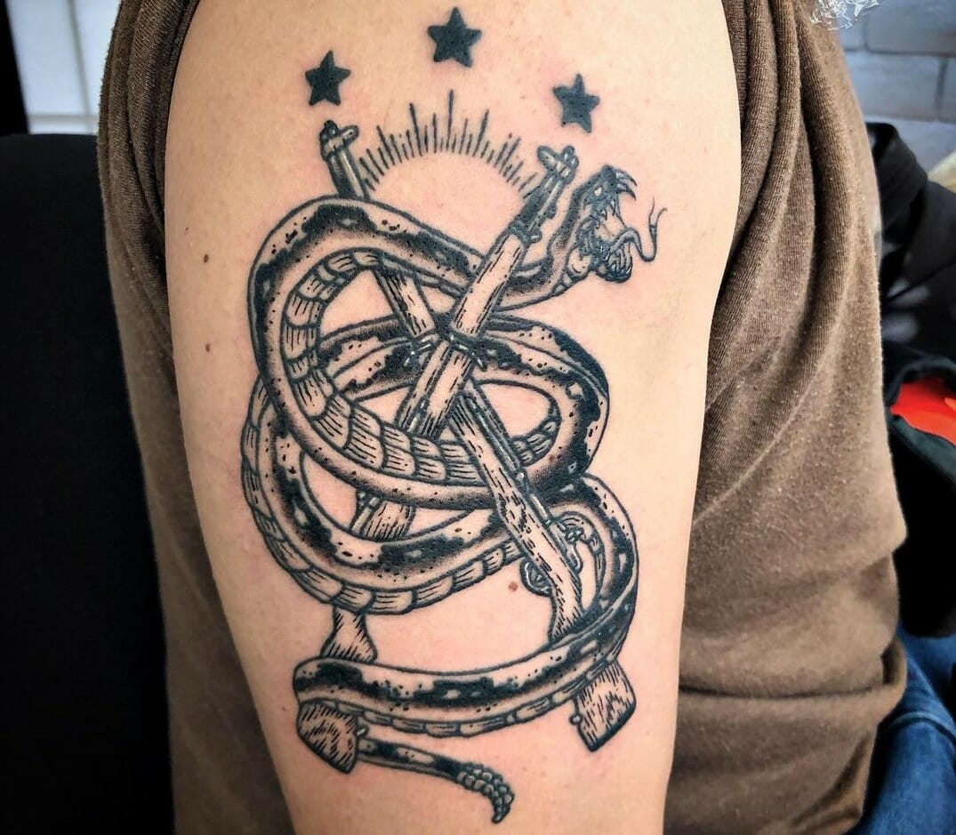 Dont Tread On Me snake with We the People in smoke tricep has a bullet  casing where the smoke comes from Not shown Done by Jove Garza  Outlaw  Ink Custom Tattoos