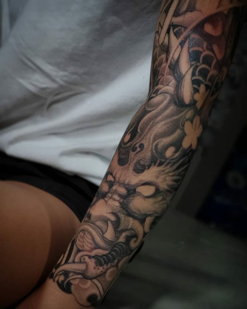 Dragon Head Sleeve Tattoo On Arm
