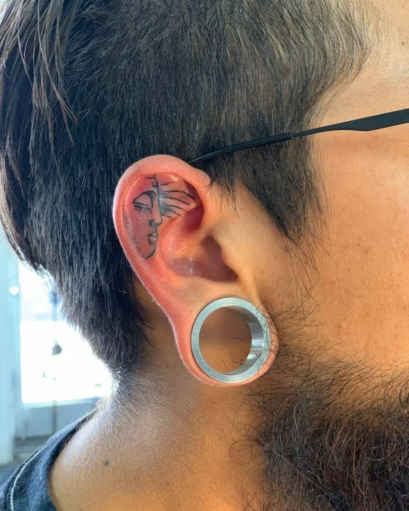 Ear Tattoo With Buddha