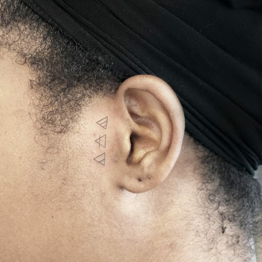Ear Tattoos With Abstract Symbols