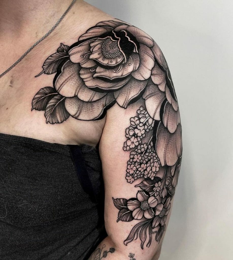 Elaborate Flower Shoulder And Upper Arm Tattoo