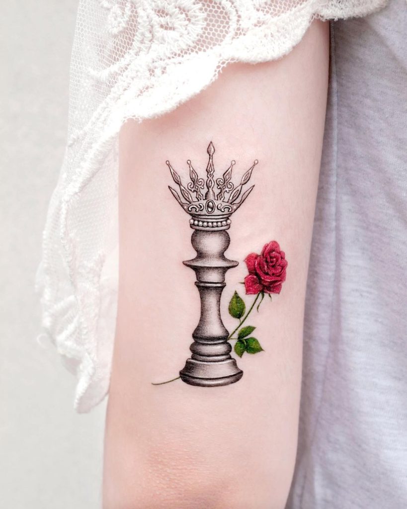 Enticing Queen Tattoo With A Rose