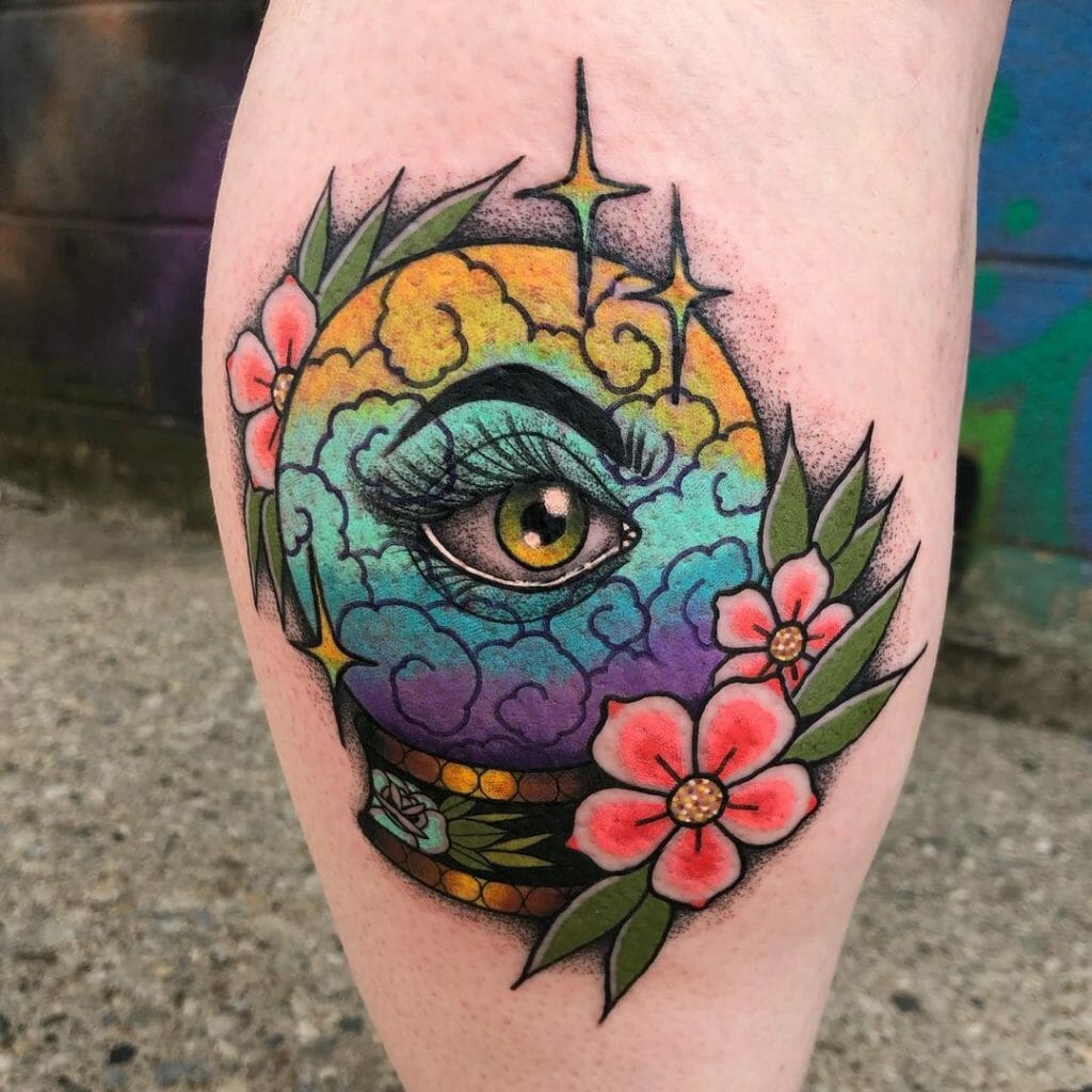 Floral Design Of A Crystal Ball Tattoo