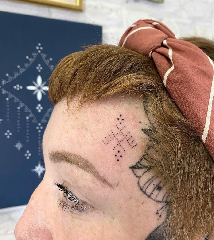 Handpoked Forehead Tattoo
