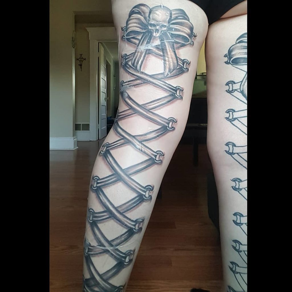 Ideas For Beautiful Corset Tattoo At The Back Of Your Leg