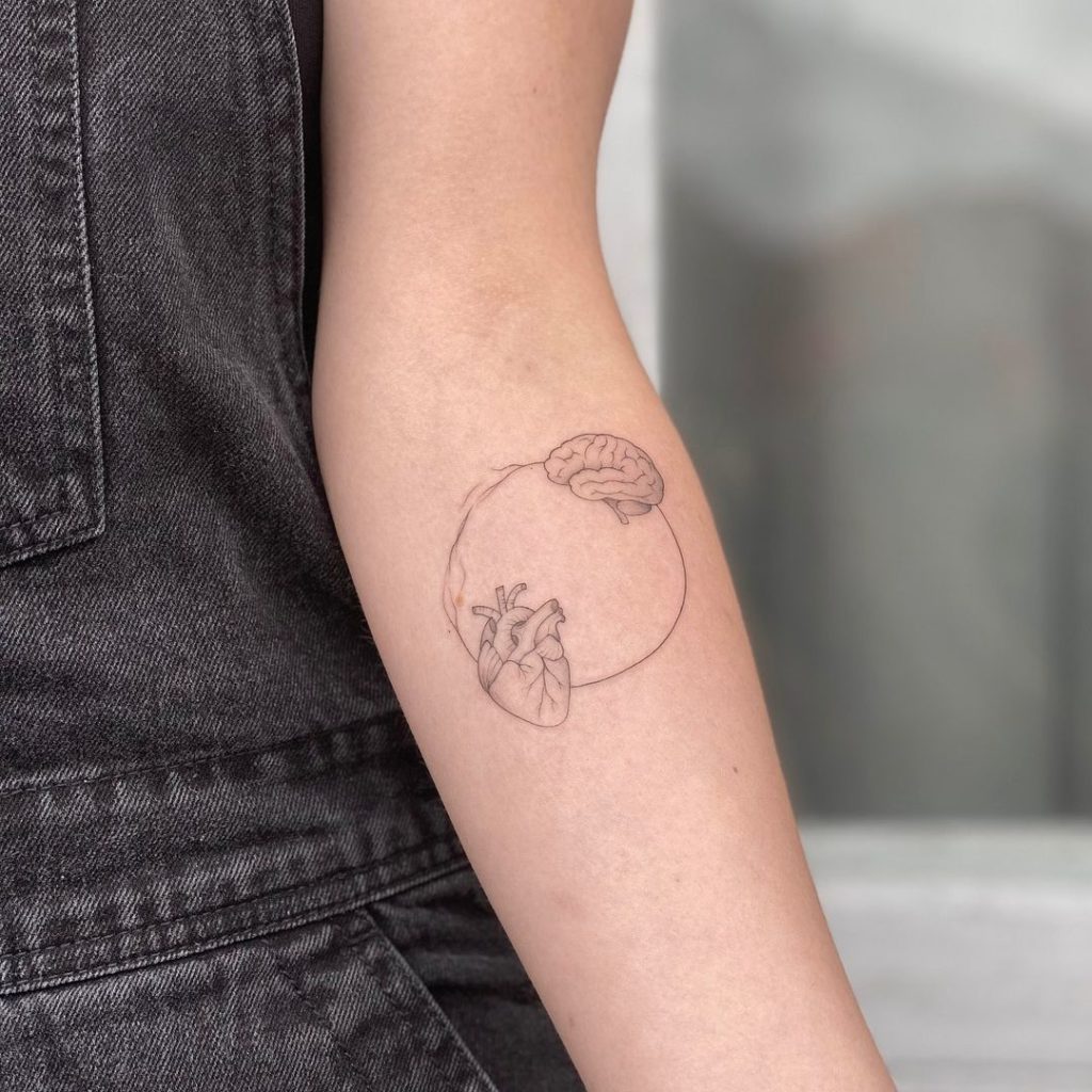 Meaningful Heart And Brain Circle Tattoo