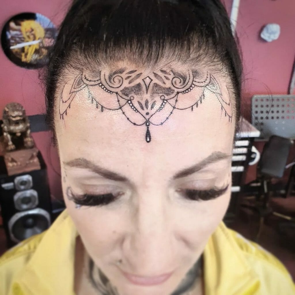 Ornamental Forehead Tattoo