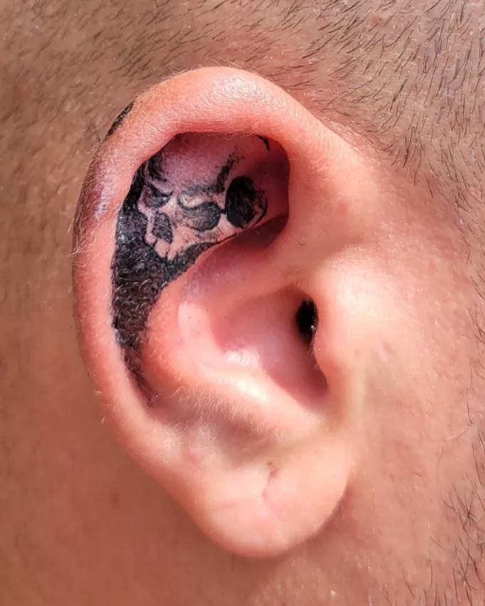 Skull Ear Tattoo