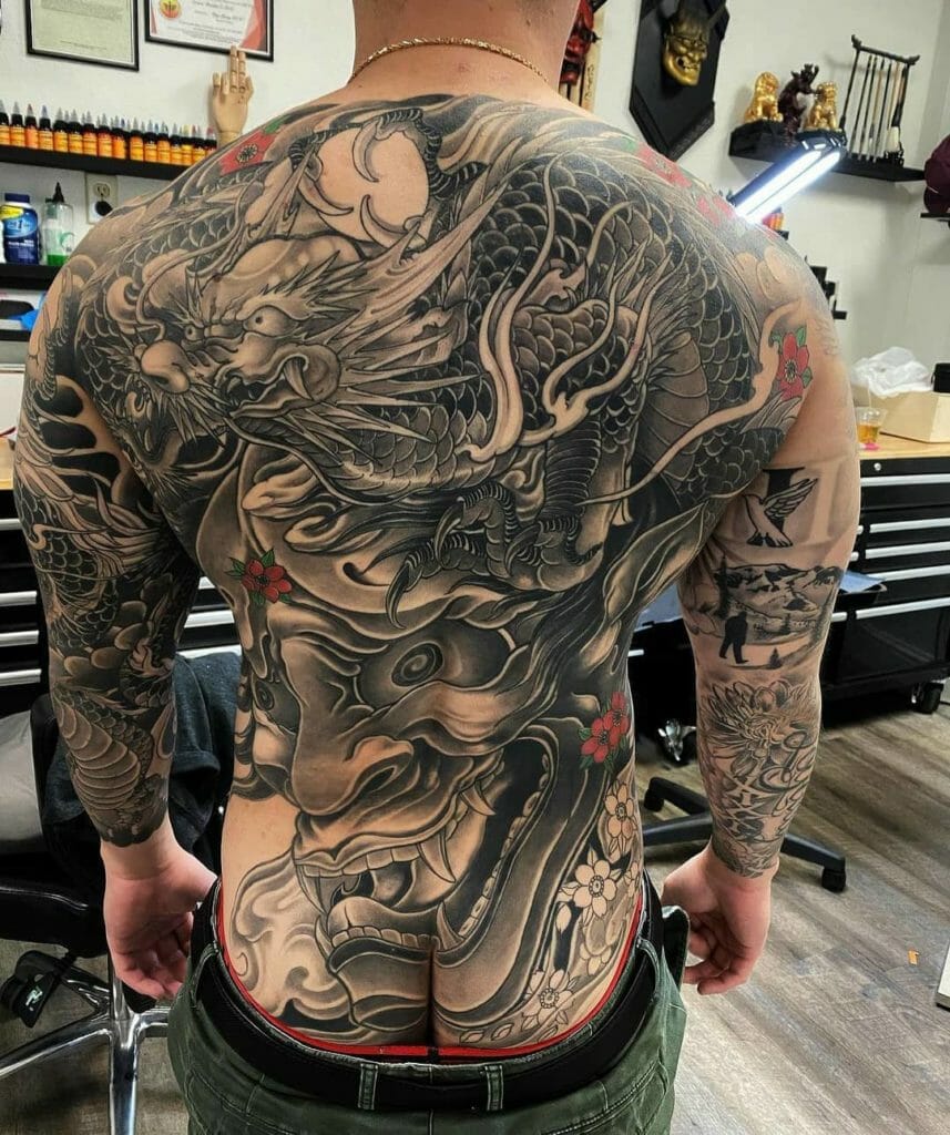 Symbolic Japanese Dragon Back Tattoo Design For Men