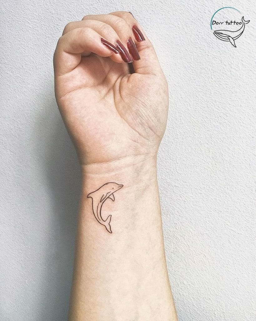 Tiny Dolphin Tattoo