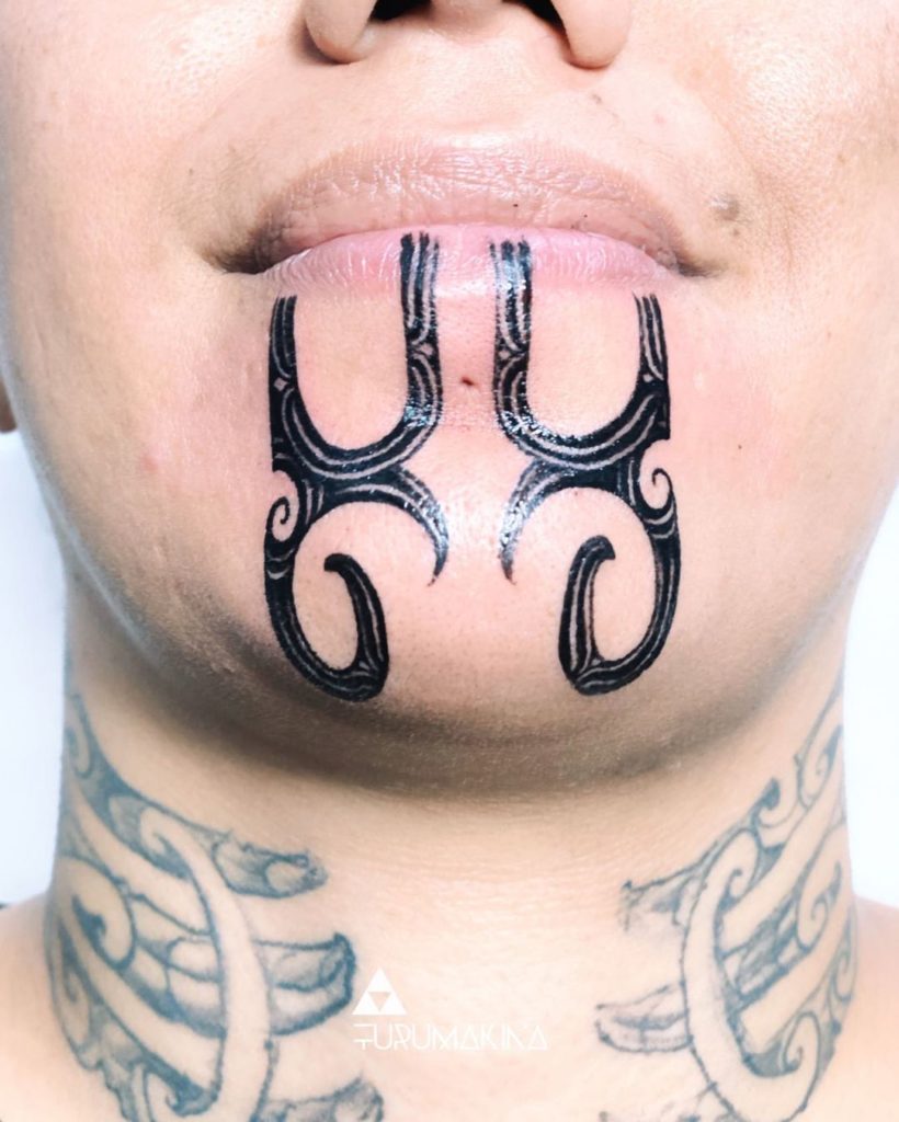 Tribal Chin Tattoo