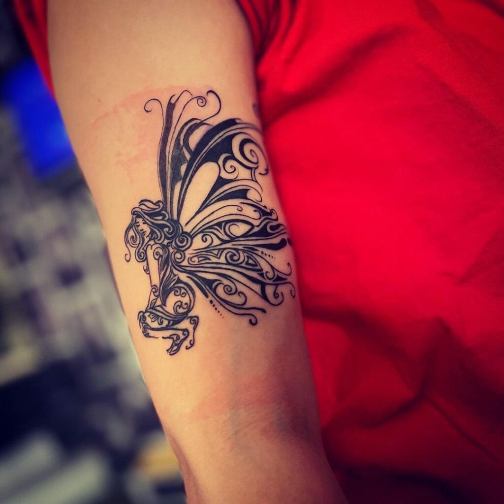 Tribal Fairy Tattoo Design On Arm