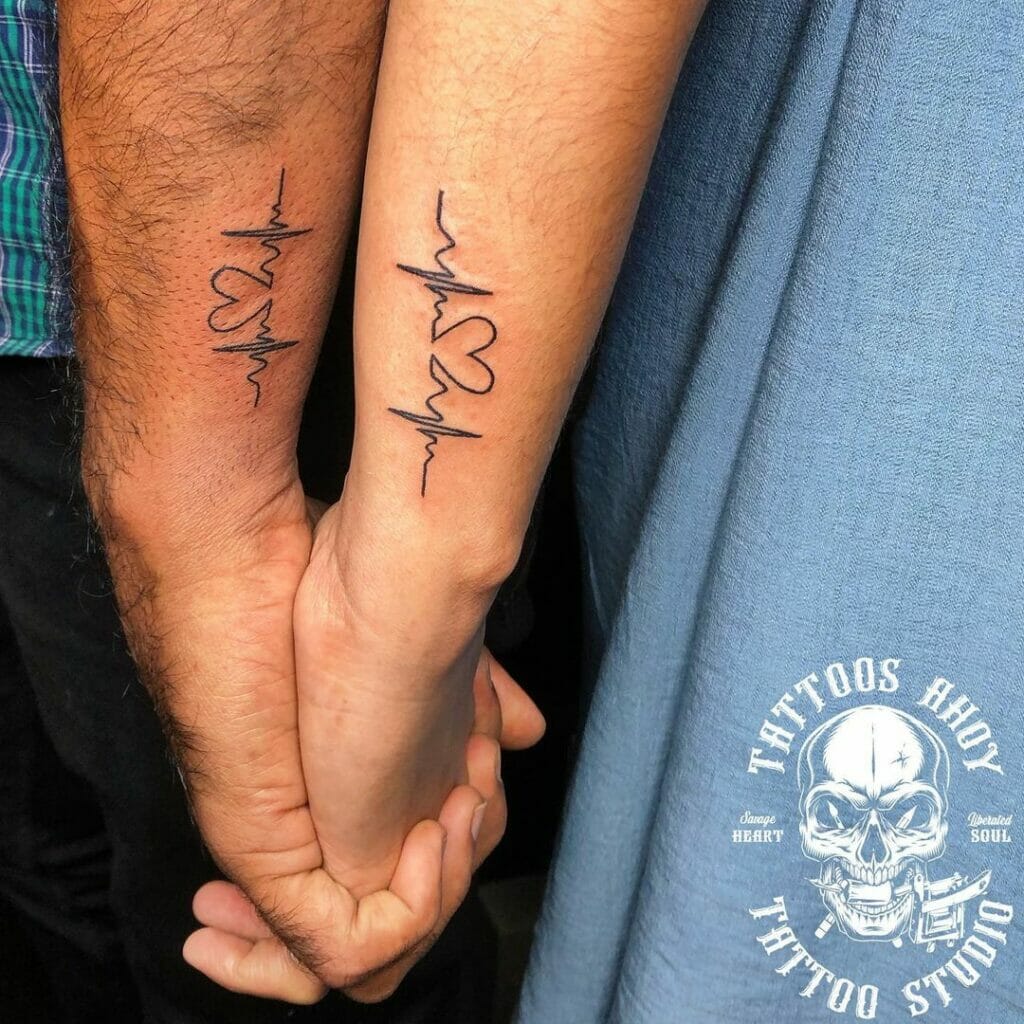 A Loving Couple Heartbeat Tattoo Designs