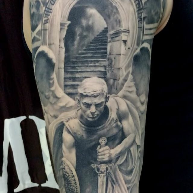 A Tattoo Of A Warrior Angel’s Statue