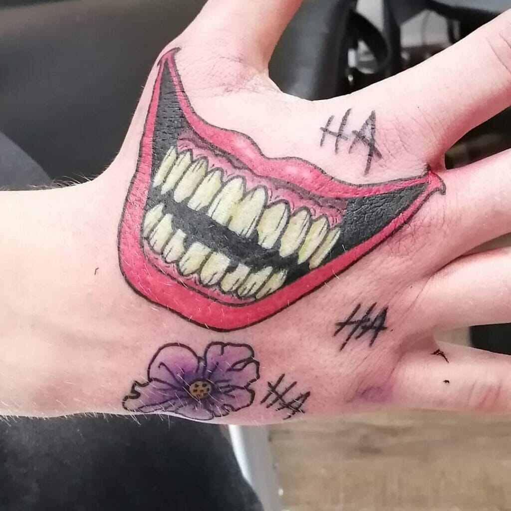 Awesome Joker Hand Tattoos With The Words 'Ha Ha Ha'