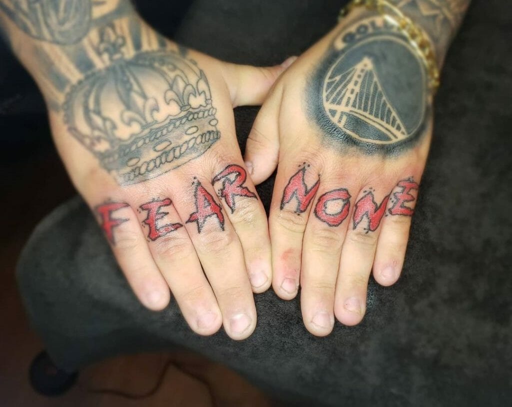 Fear None Hand Tattoo
