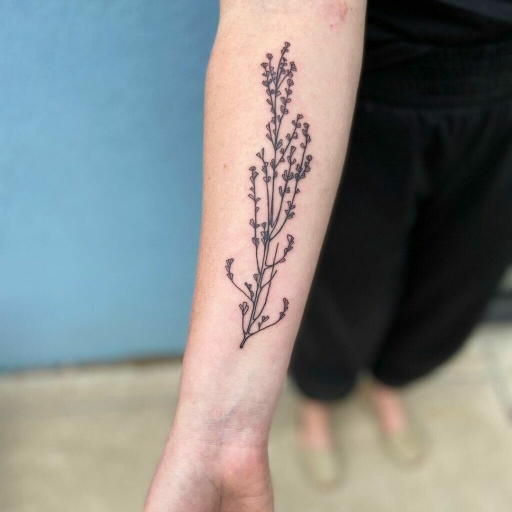 Flower Inner Forearm Tattoo