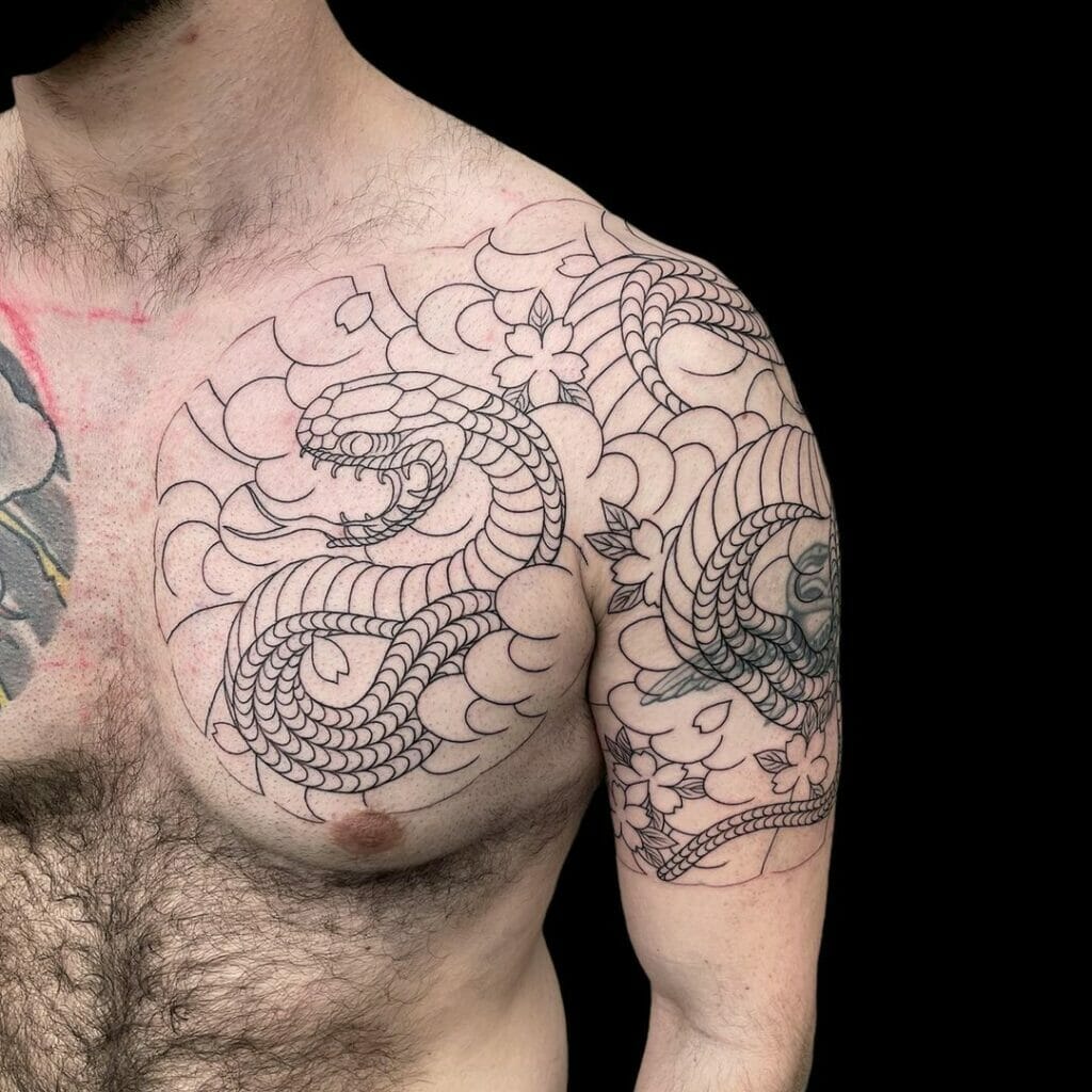Shoulder Snake Chest Tattoo by Hyperink Studios