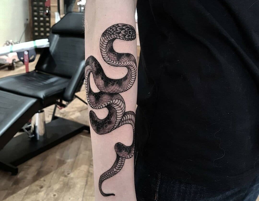 Japanese snake tattoo on his arm  Joel Gordon Photography