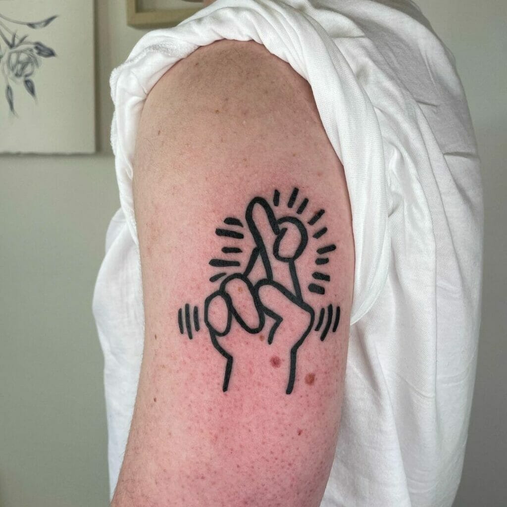 Keith Haring Fingers Crossed Tattoo