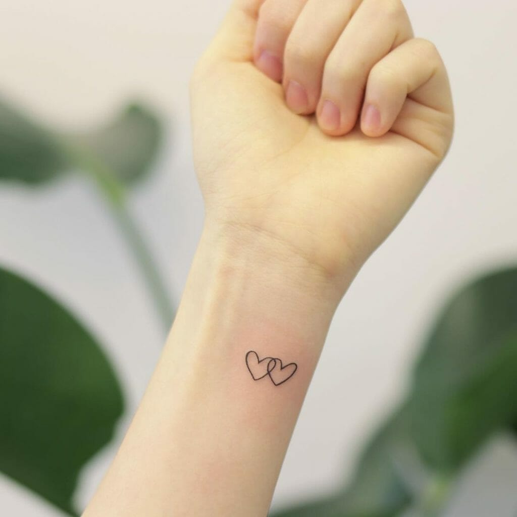 Mini Heart Outline Tattoo