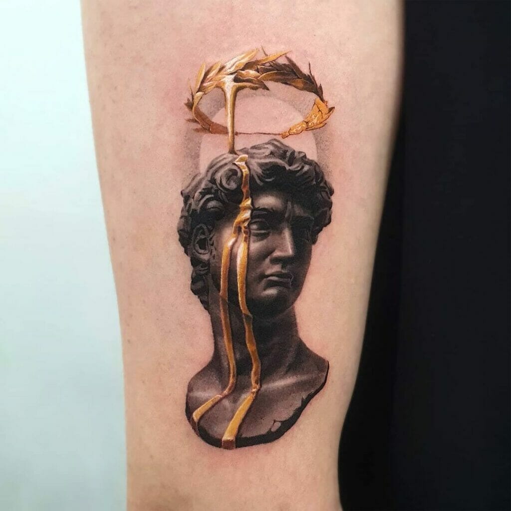 The Caesar Melted Gold Crown Tattoo