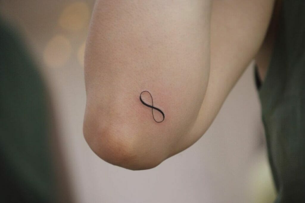 Tiny Infinity Sign Tattoo