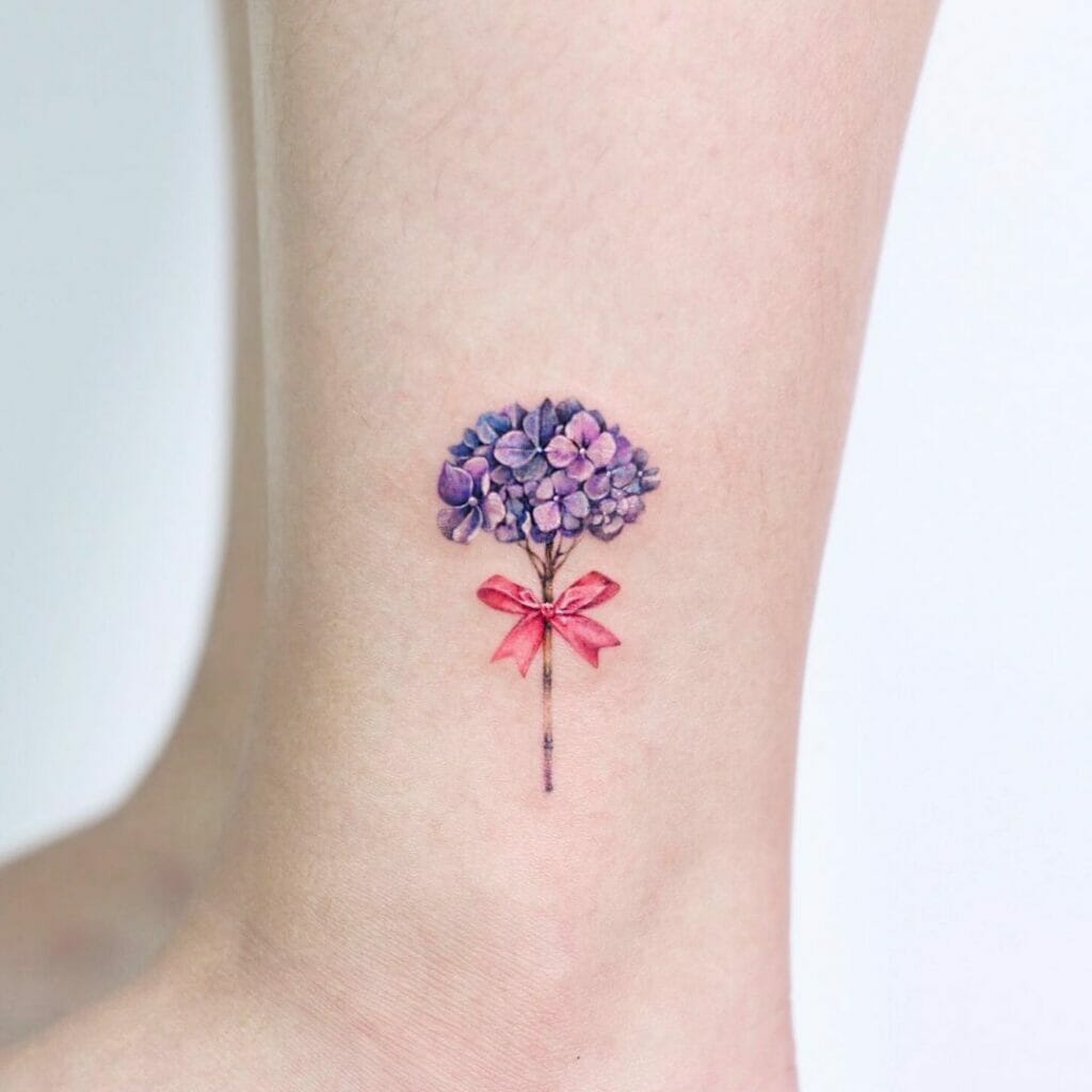 Tiny Purple Hydrangea Flower Tattoo With Ribbon