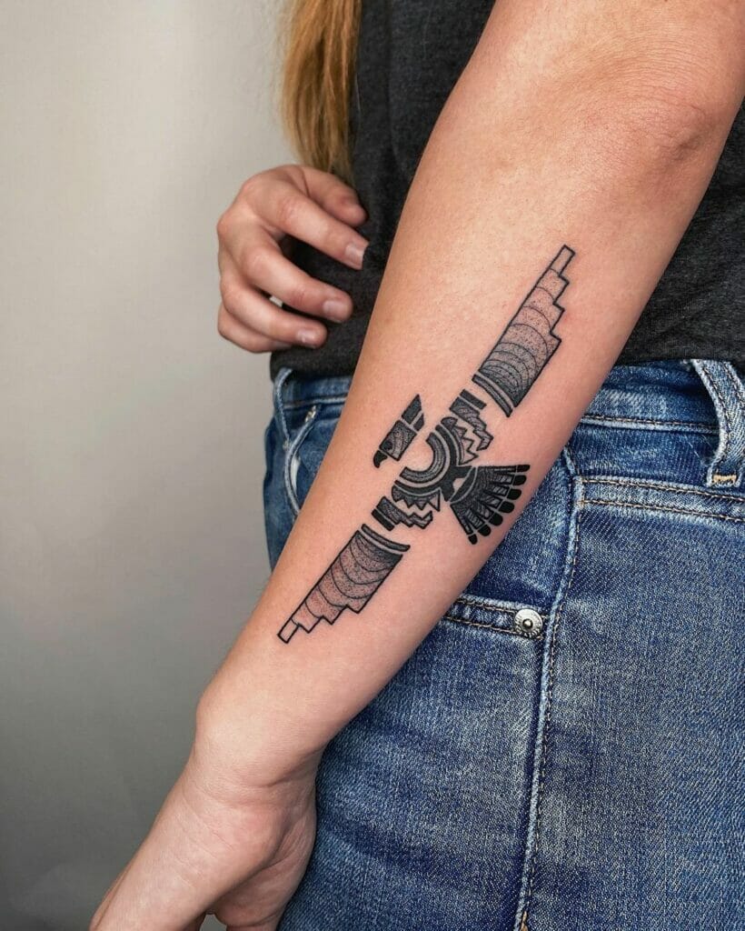 A Beautiful Blackwork Thunderbird Arm Tattoo