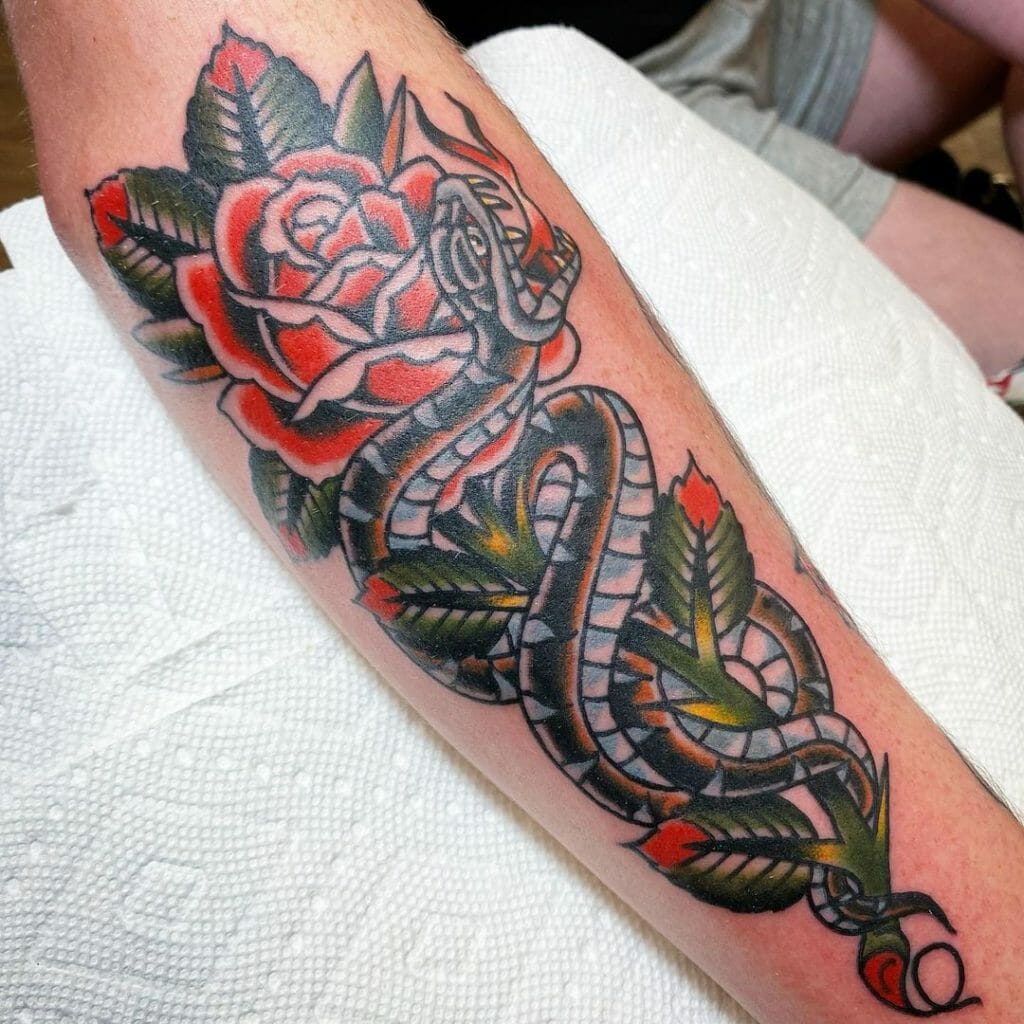 A Colorful Snake And Rose Tattoo