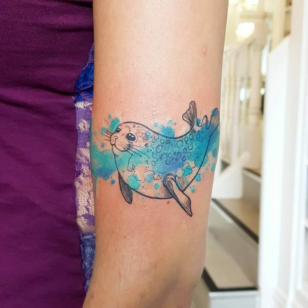 A Colourful Line-Art Seal Tattoo