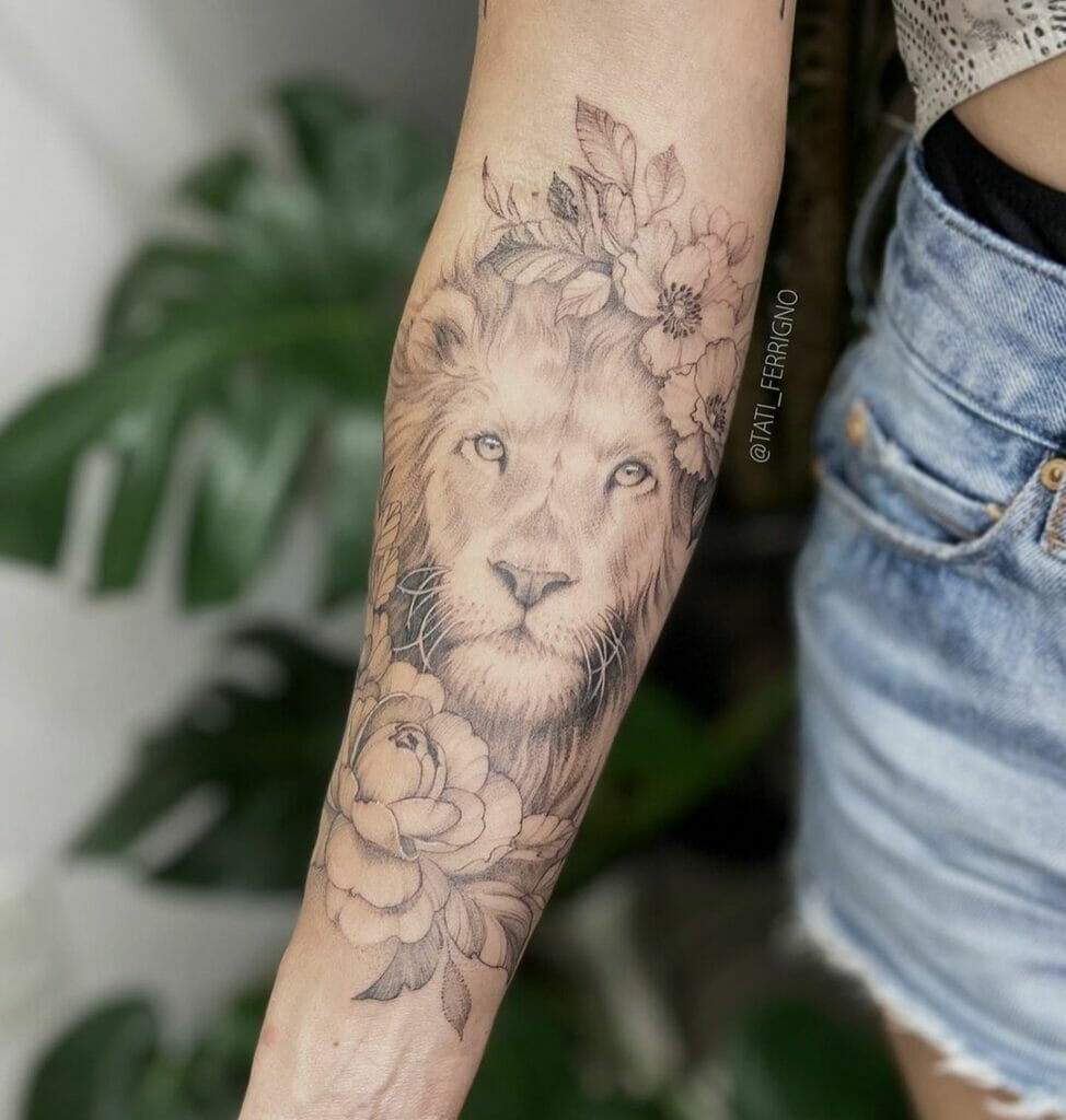 A Lion With Flower Crown Tattoo