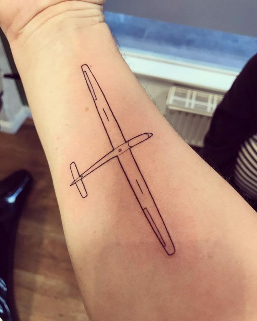 A Minimal Line-Art Airplane Tattoo