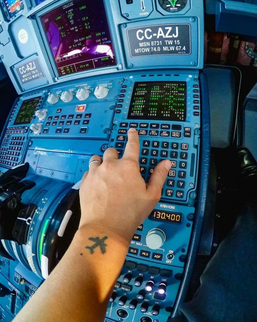 A Small Wrist Airplane Tattoo
