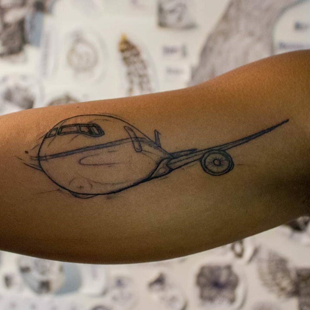 A Stunning Arm Airplane Tattoo