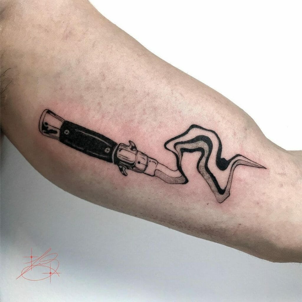 Abstract Switchblade Design Tattoo