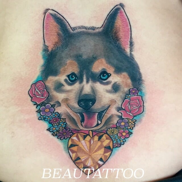 Adorable Baby Wolf With Colourful Flower Tattoos
