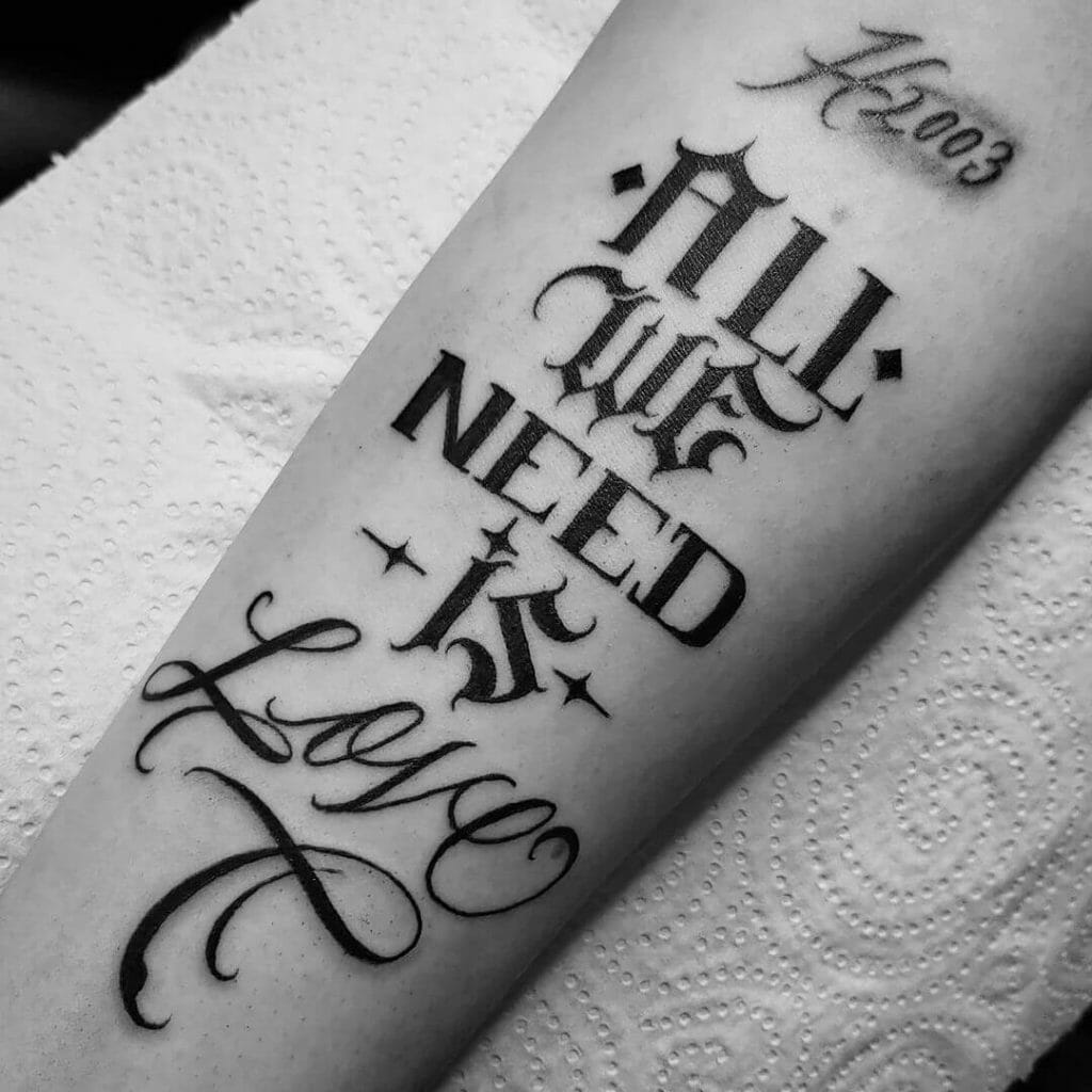 All We Need Is Love Tattoo In Mixed Fonts