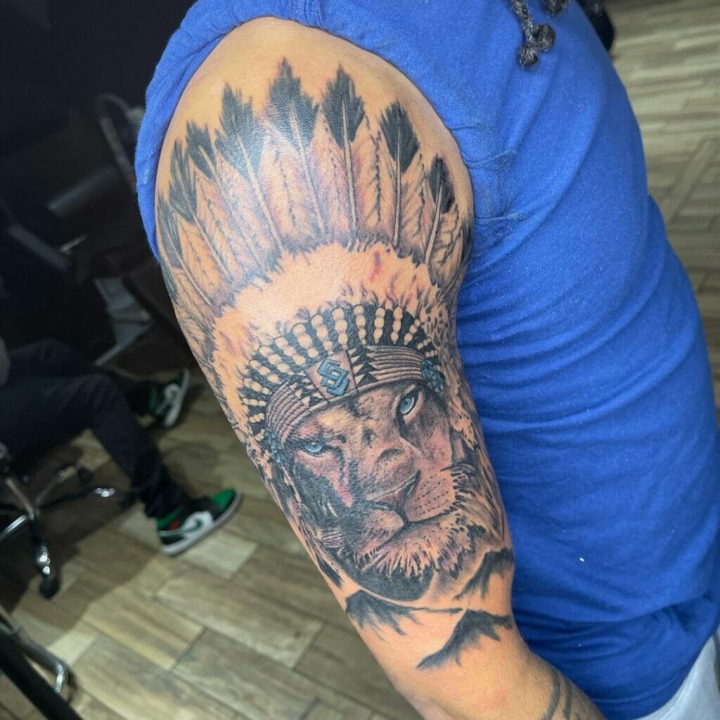 Alluring Tribal Lion Sleeve Tattoo