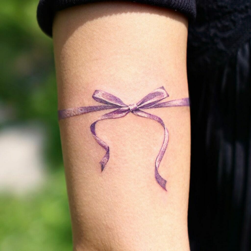 Amazing Wrap Around Ribbon Tattoo Ideas
