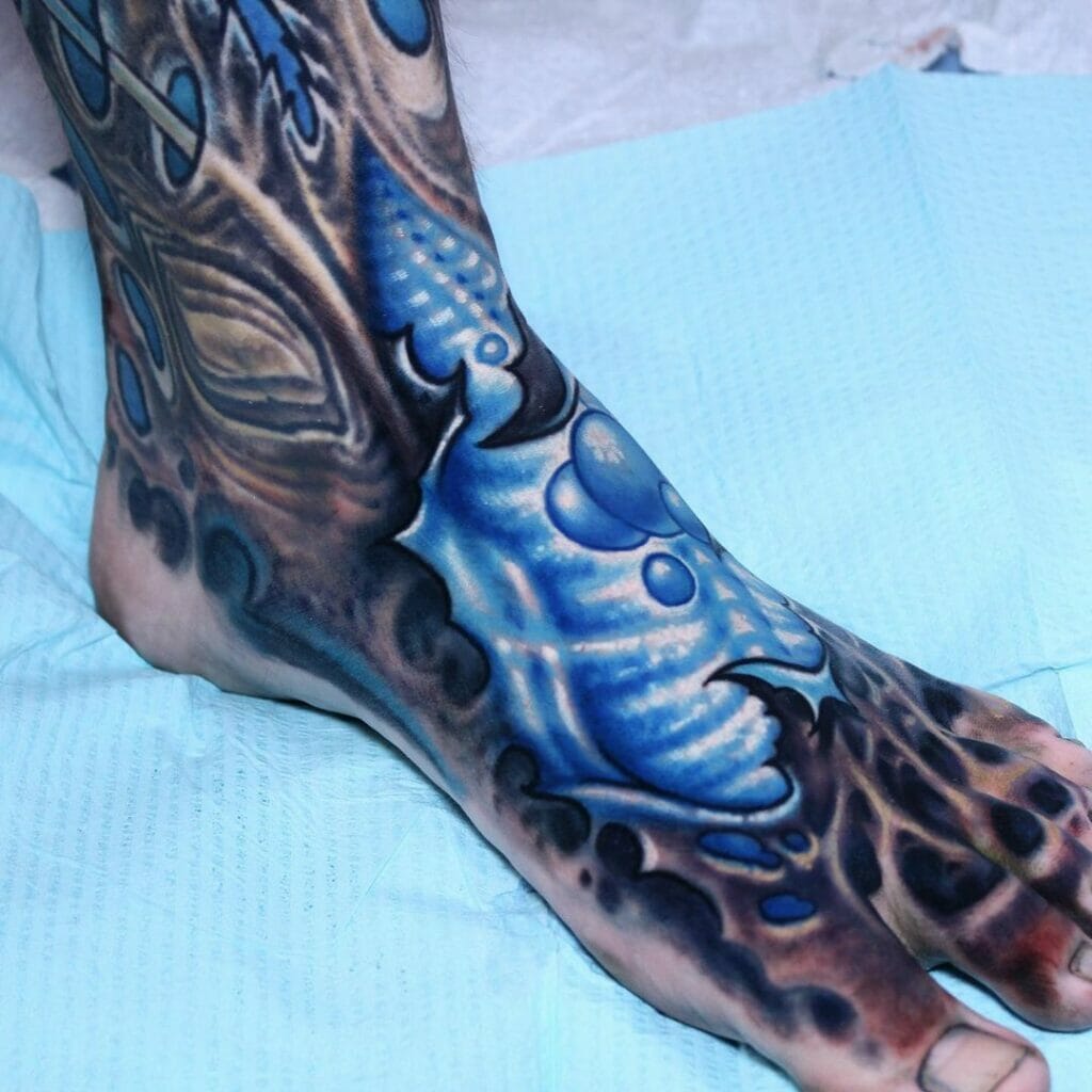 Biomechanic Tattoo On The Foot